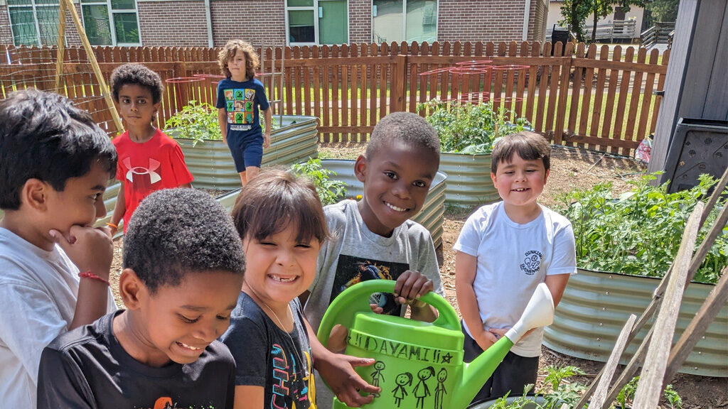 Children working in a school garden.